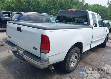 2000 Ford F150 из США, поврежденный, VIN 1FTRX17L6YNB57586